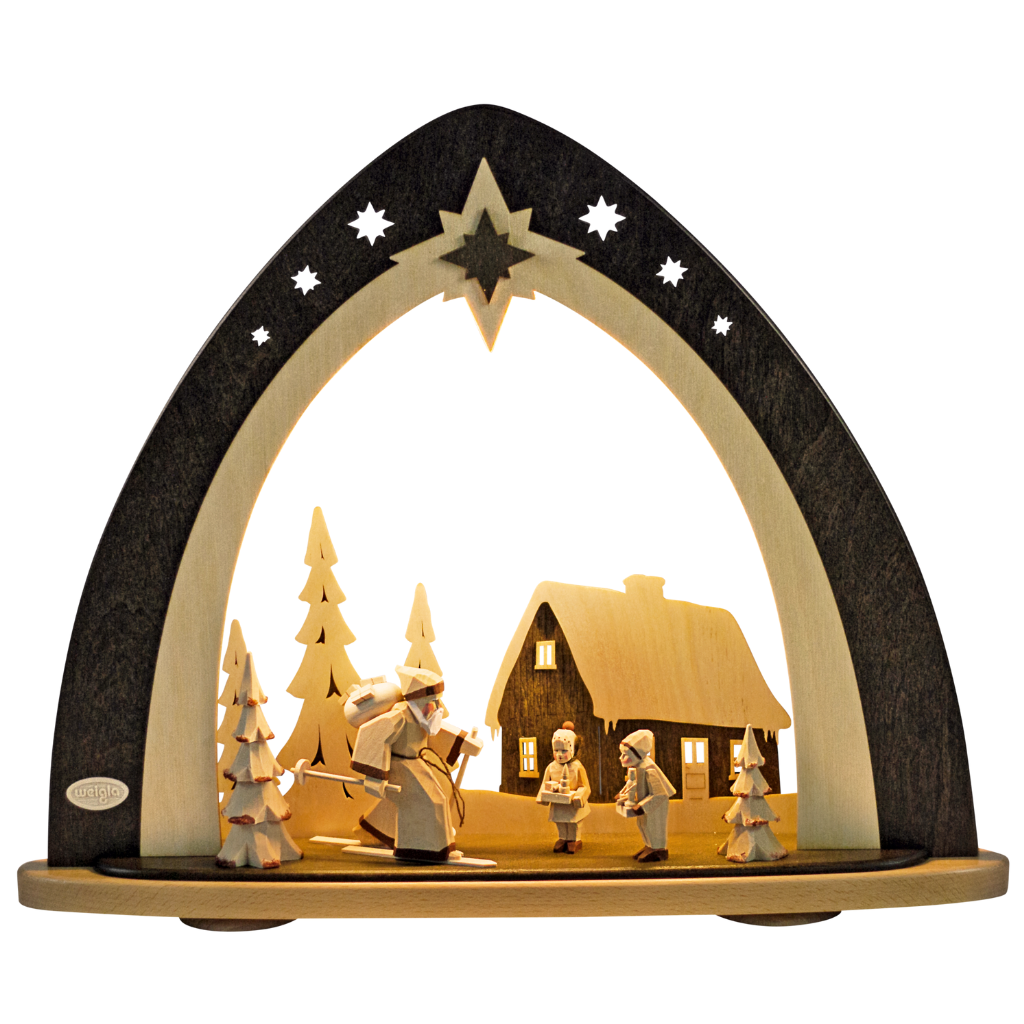 Lichterspitze Waldweihnacht LED Lichterspitze mit handgeschnitzten Figuren von Bettina Frage. Ein Weihnachtsmann auf Ski kommt aus dem Wald zu den Kindern gefahren. Hergestellt im Erzgebirge